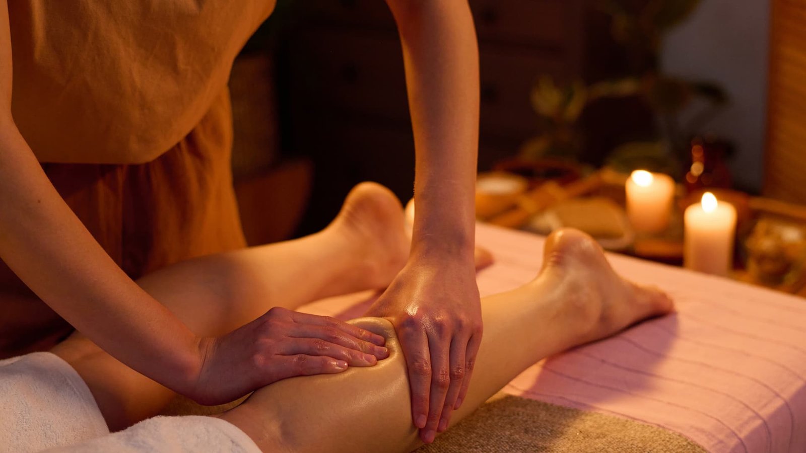 hands-of-professional-masseuse-kneading-GPU3F9Q