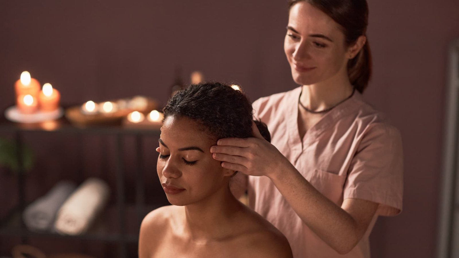 woman-getting-temples-massage-PKXF4P9